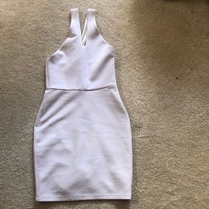White cross-back cocktail dress.